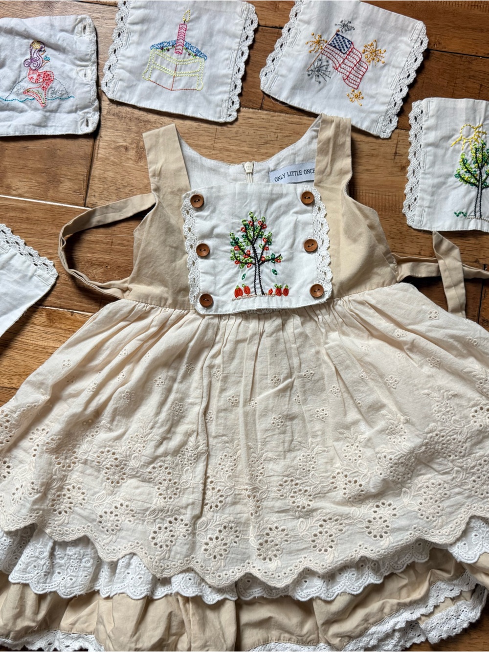Only Little Once Cream Eyelet Pinafore Dress with Embroidered Tree Bib